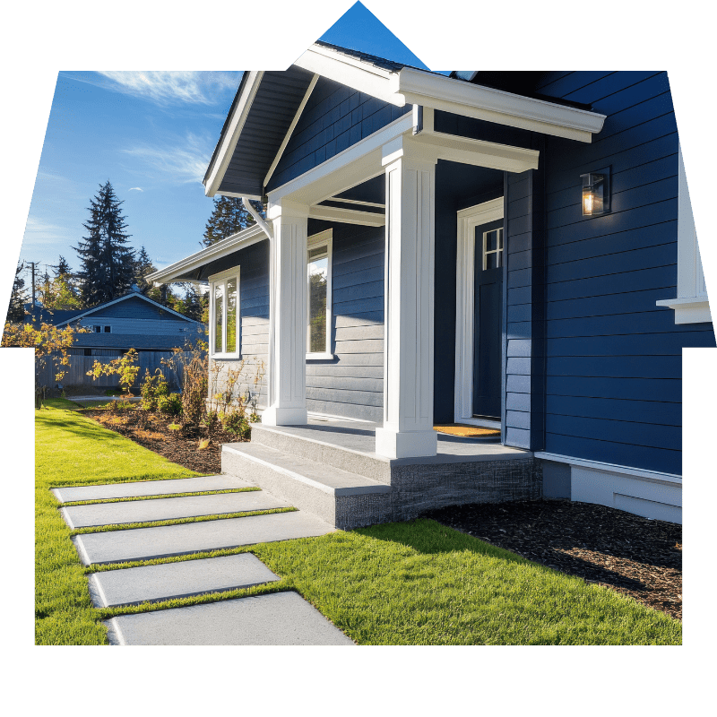 Elegant home entrance with white columns and vibrant blue siding, showcasing Bayside Builders Group’s expertise in Bay Area home remodeling and construction.